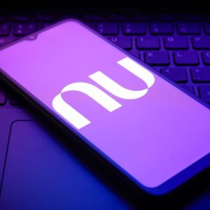 The Nu Holdings (nubank) Logo Appears On A Smartphone